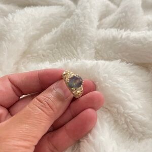 Gently used gold peridot stone ring